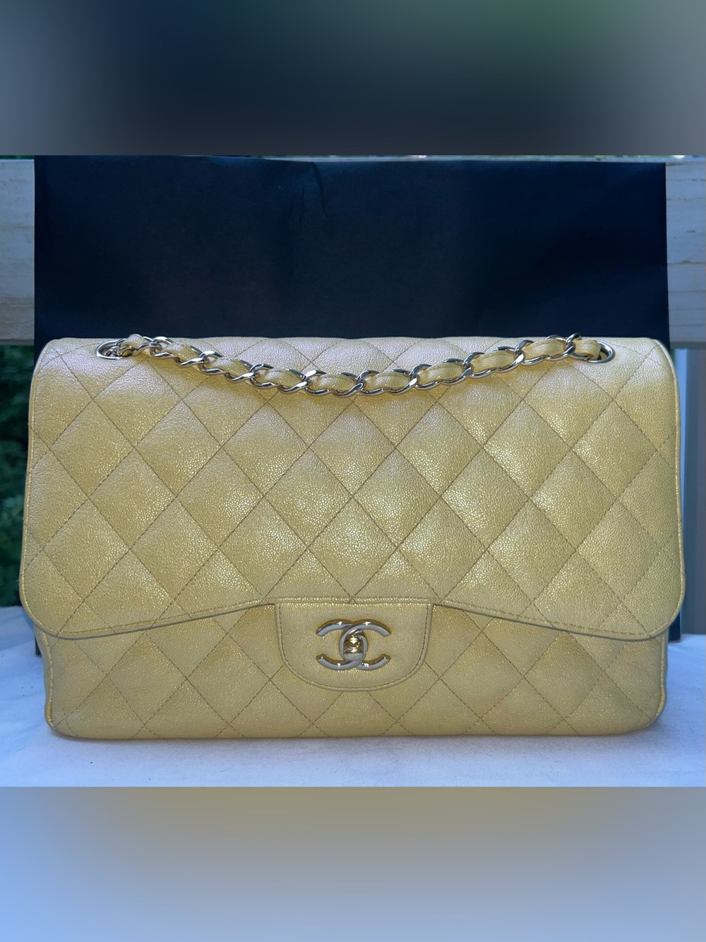 CHANEL Classic Jumbo Double Flap Quilted Caviar Handbag Iridescent Light Yellow